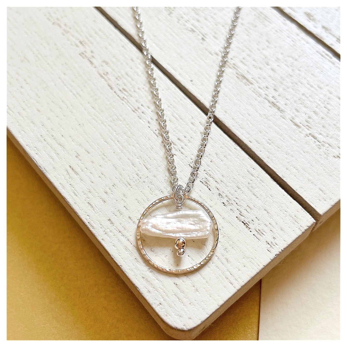 Mini 9ct Yellow Gold Hammered circle, Sterling Silver and pearl Necklace.