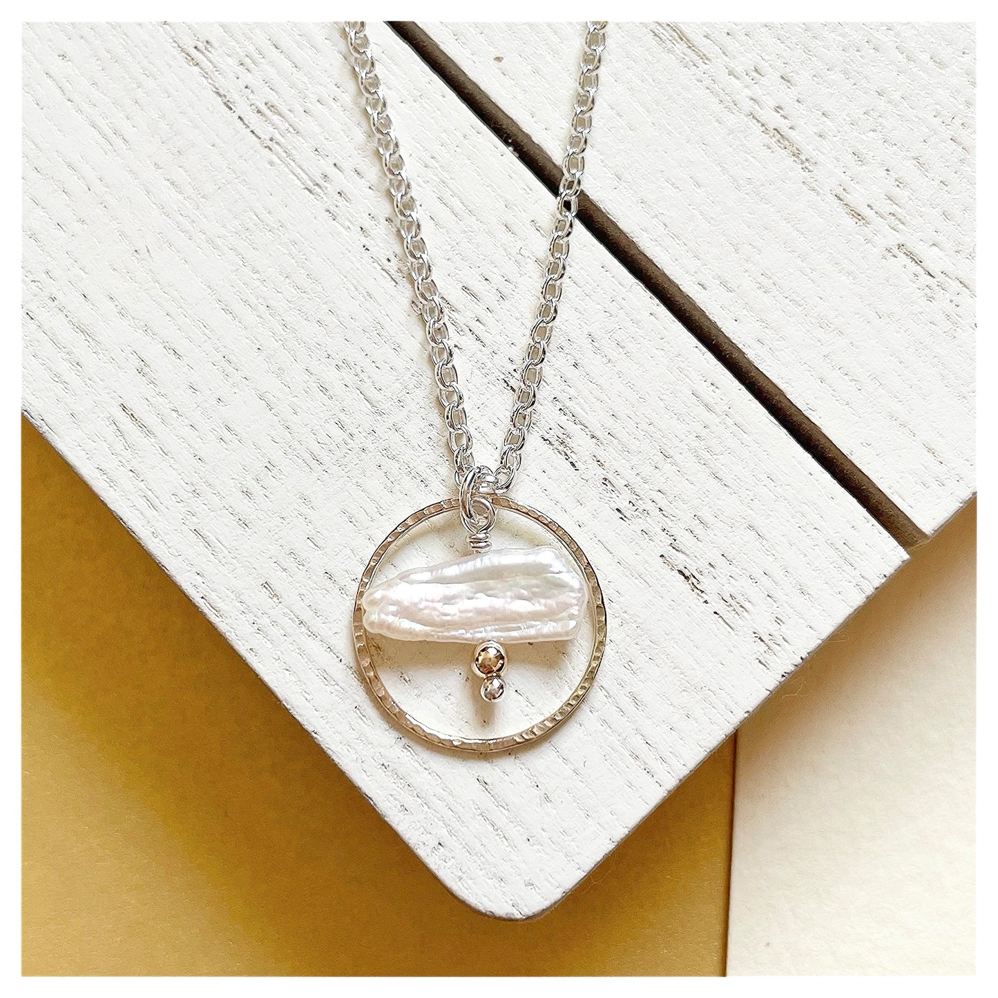 Mini 9ct Yellow Gold Hammered circle, Sterling Silver and pearl Necklace.