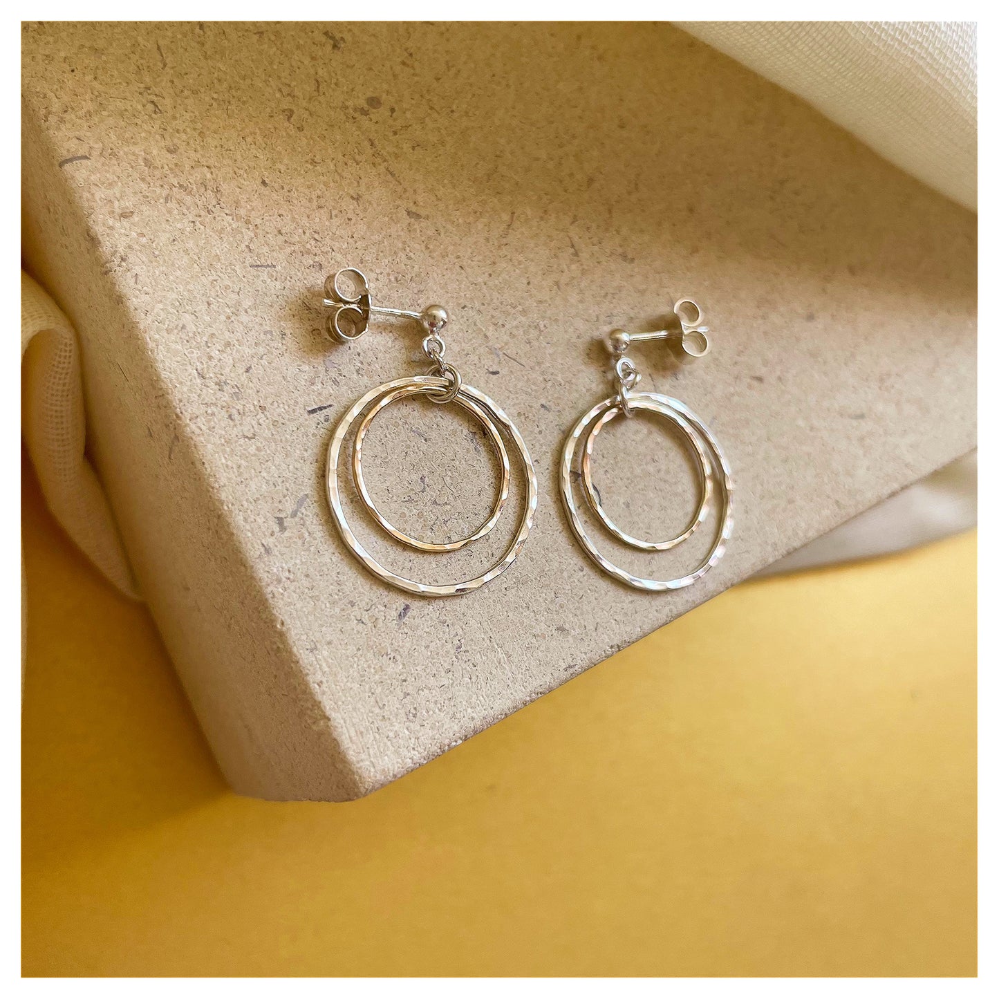 Sterling Silver and 9ct Gold Hammered Double Circle Drop Stud earrings.