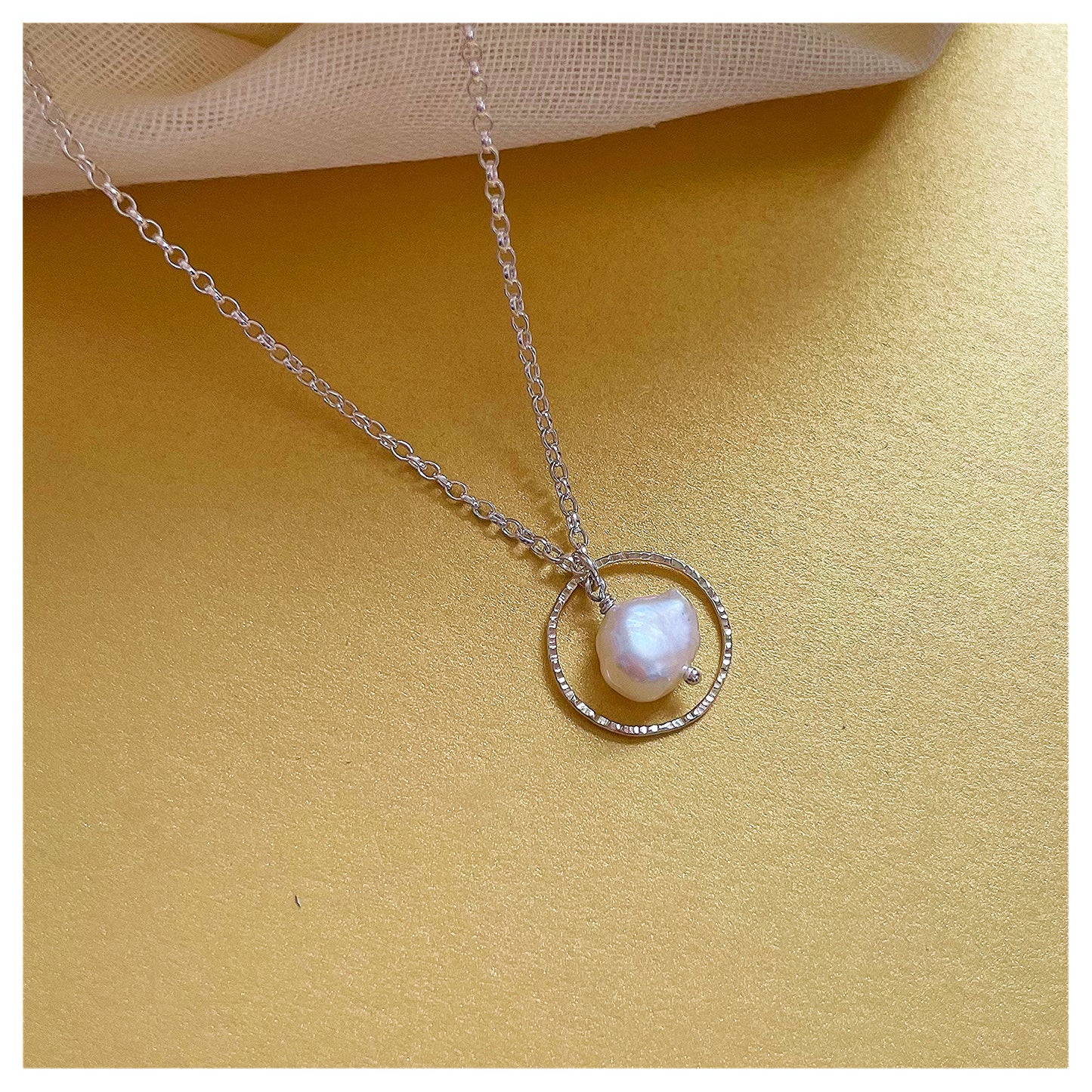 Mini 9ct Yellow Gold Hammered Circle, Sterling Silver and Fresh Water Pearl Necklace.