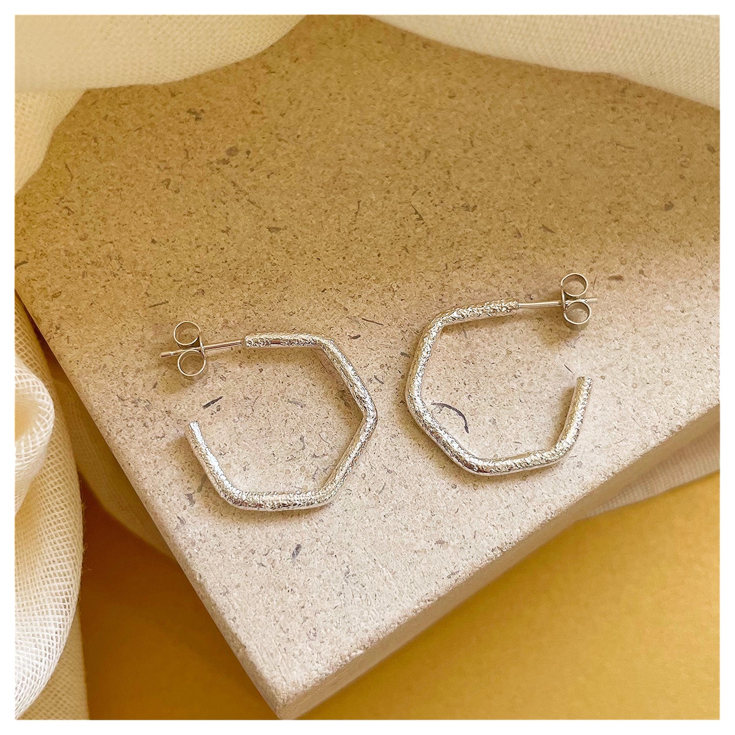 Sterling Silver Chunky Textured Hexagonal Hoop Earrings.