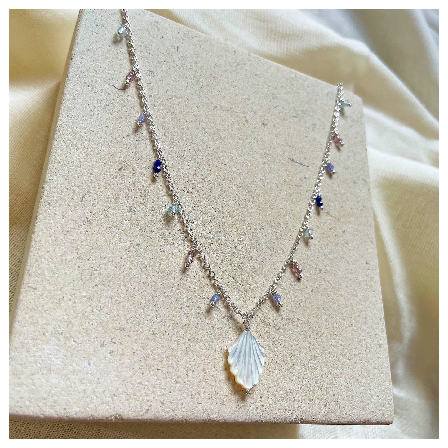 Sterling Silver, Mother of Pearl Shell and Gemstone Beaded Necklace. (2)