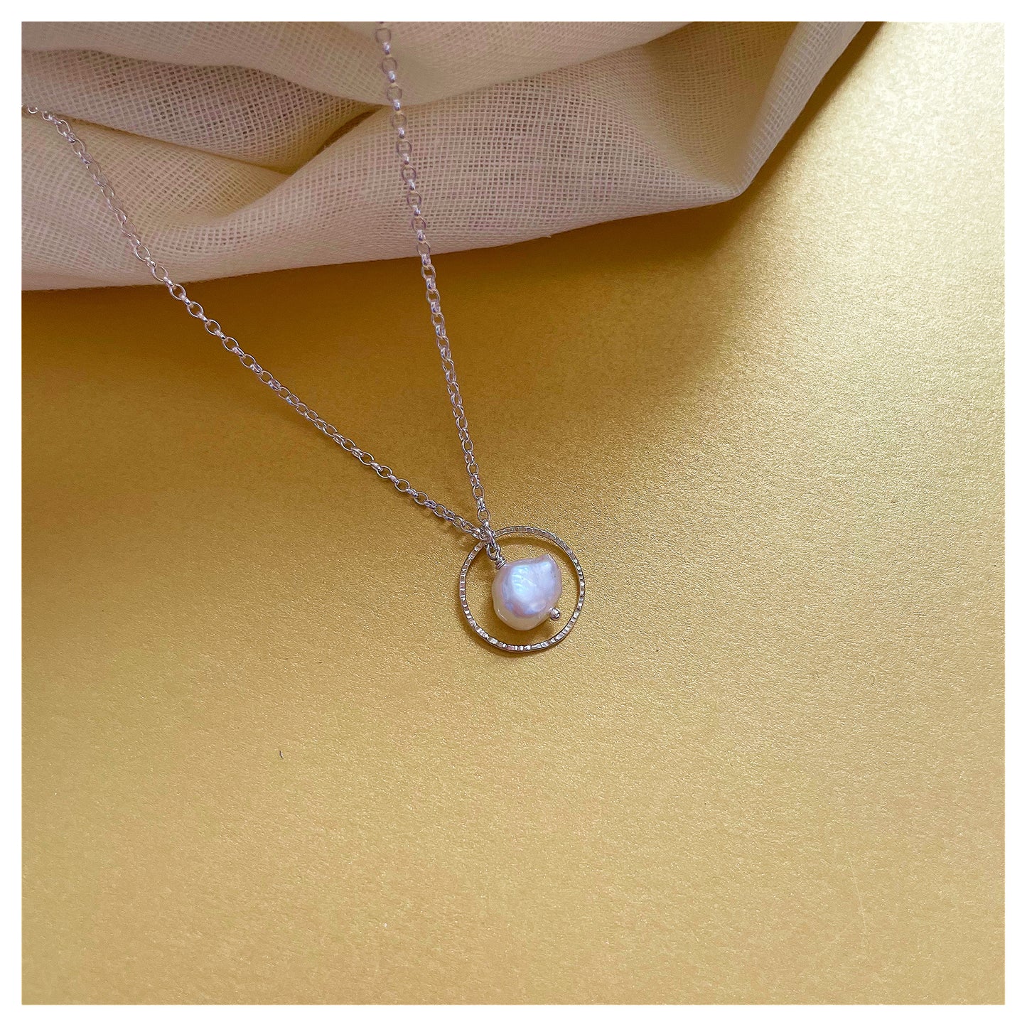 Mini 9ct Yellow Gold Hammered Circle, Sterling Silver and Fresh Water Pearl Necklace.