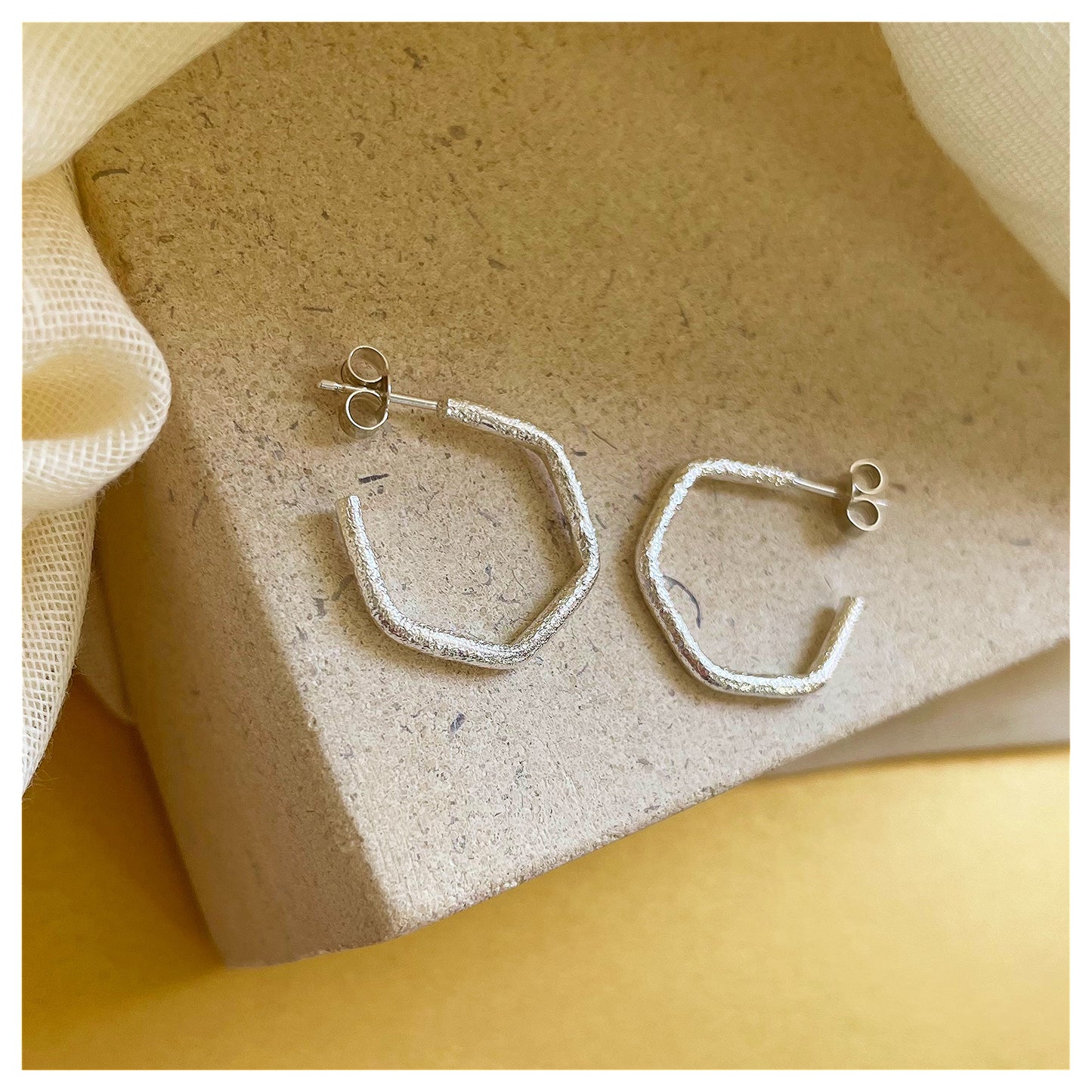 Sterling Silver Chunky Textured Hexagonal Hoop Earrings.