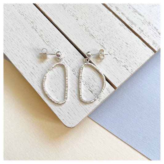 Sterling Silver Organic Hammered Segment Earrings.